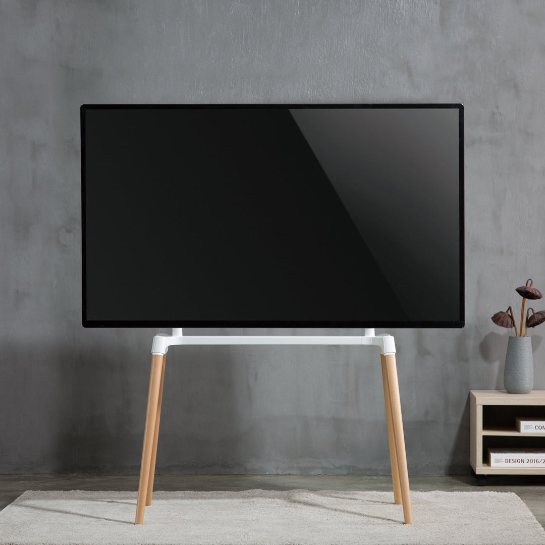 front image of TV on Kensington TV stand with 4 legs for 60″ to 75″ TVs - SimplyForest.com