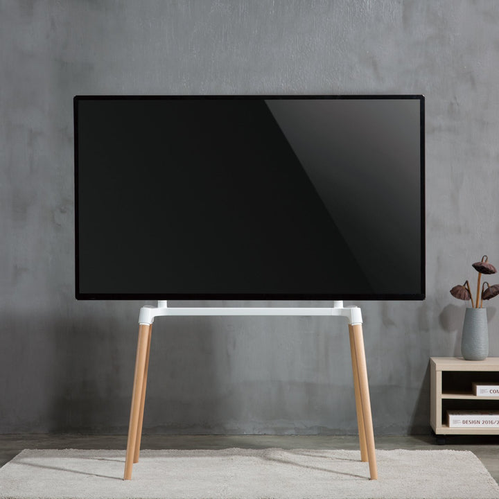 front image of TV on Kensington TV stand with 4 legs for 60″ to 75″ TVs - SimplyForest.com